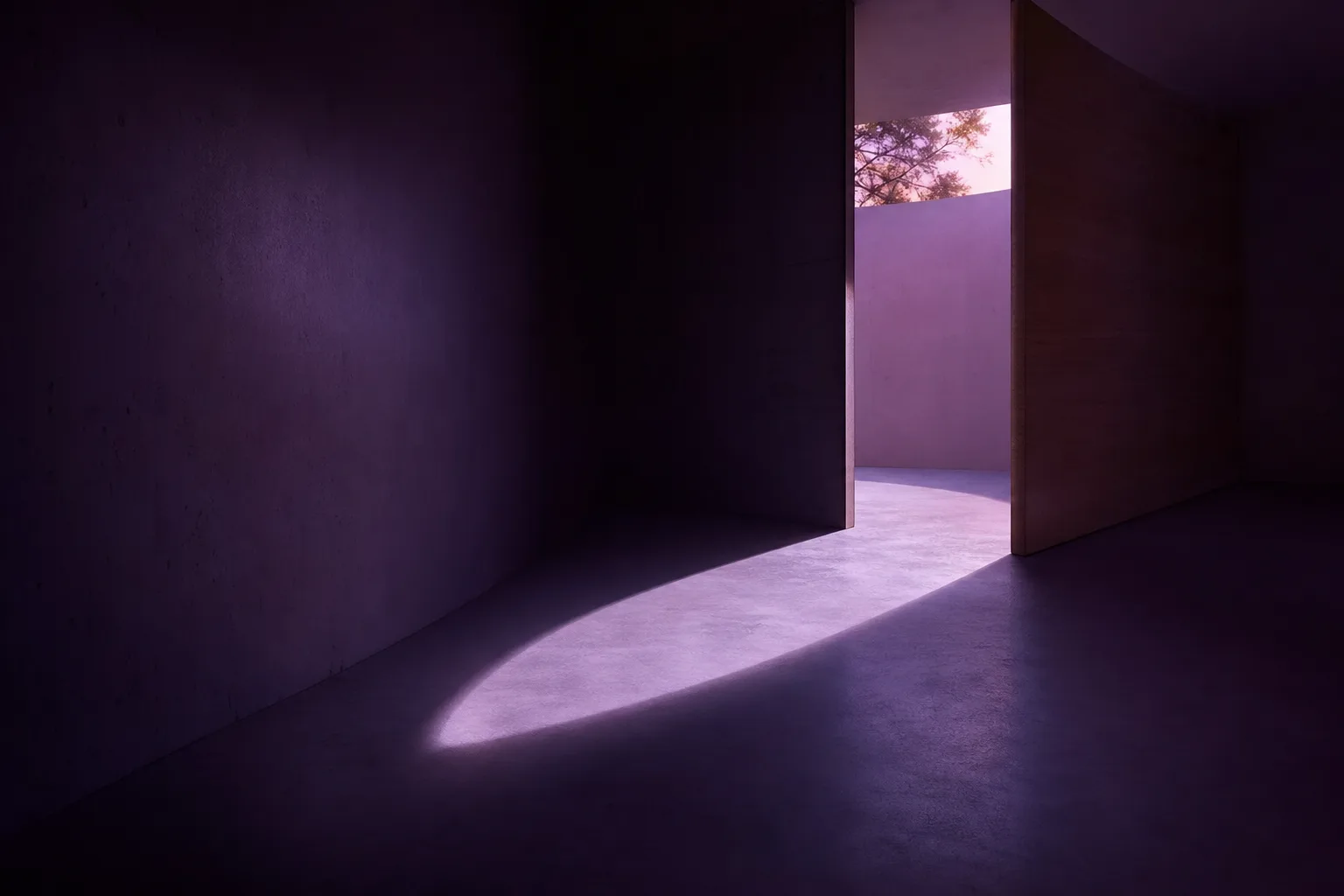 Light falling through a doorway into a quiet interior